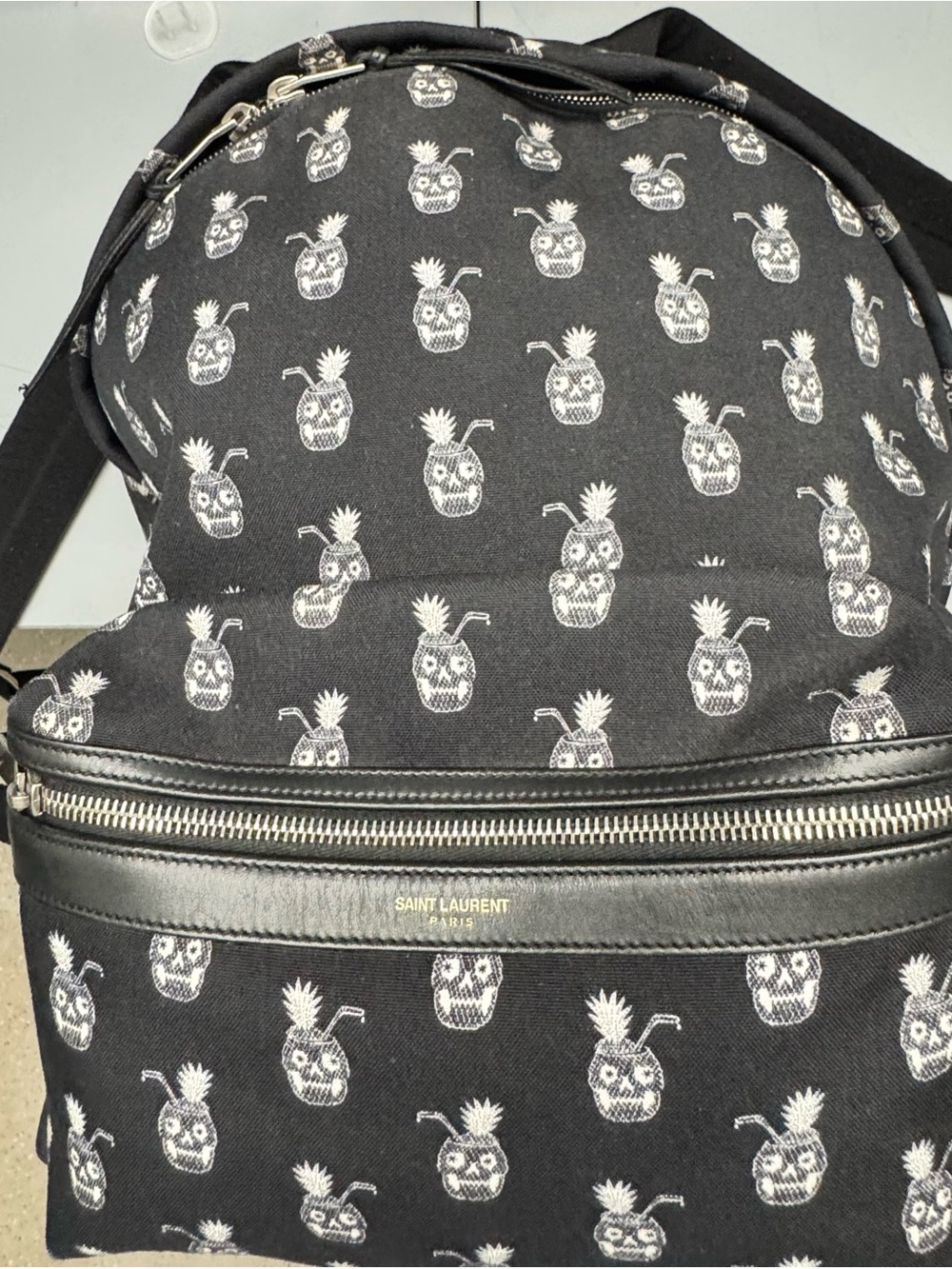 Saint Laurent Black Canvas Backpack with White Pineapple Skull Motif
